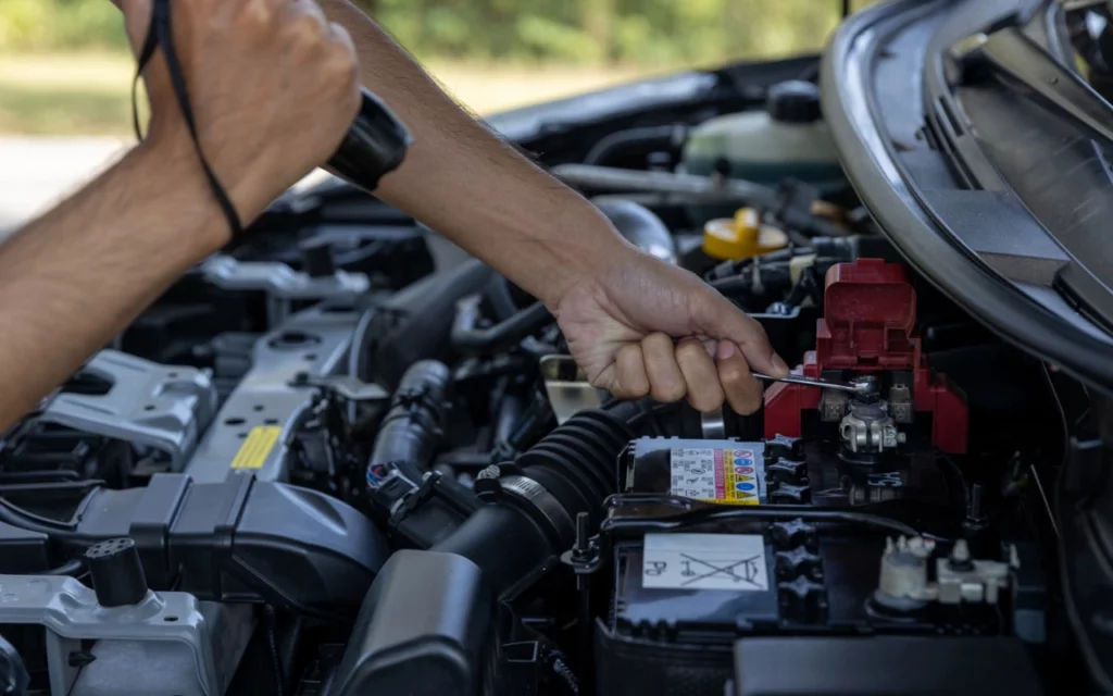 man-is-checking-car-battery
